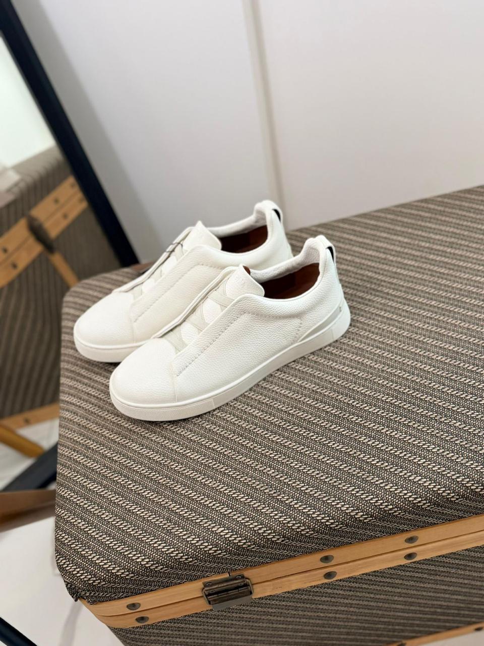 ZEGNA Triple Stitch™ slip-on sneaker in white leather.