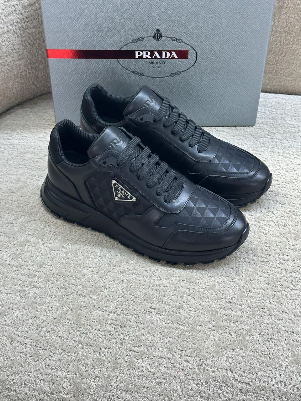 Prada Geometric-Pattern Panelled Sneakers (Black)